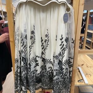 Torrid Ivory Fabric with Black Label